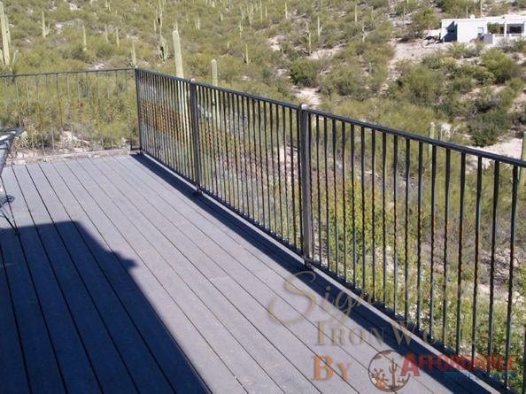 Wrought iron handrail on deck with a twist pattern - Installed in the Catalina Foothills IF207-2