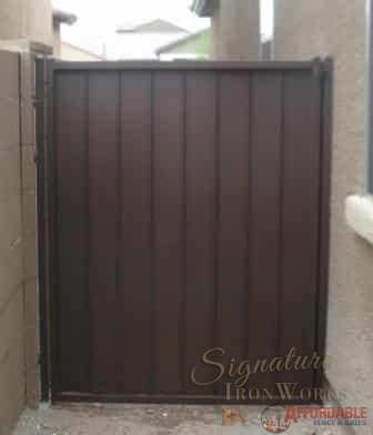 Wrought iron gate with steel backing and latch made in tucson IG012