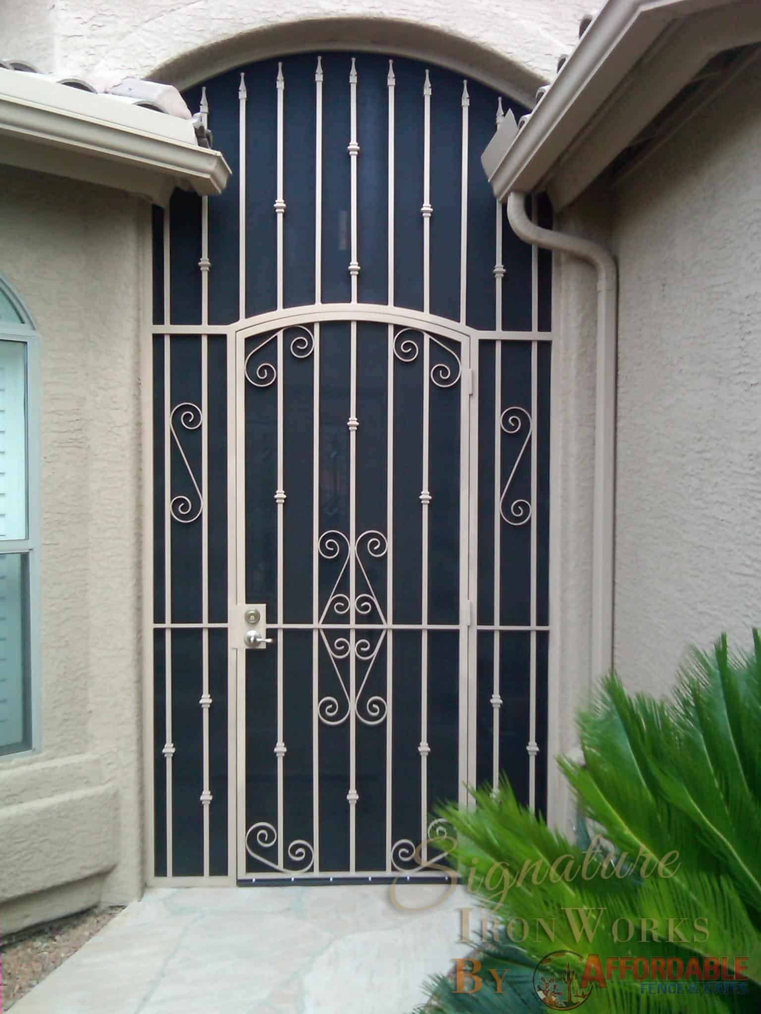 Security door enclosure with 3 panels - Painted and decorated with swirls 5000 E - Installed in Tucson