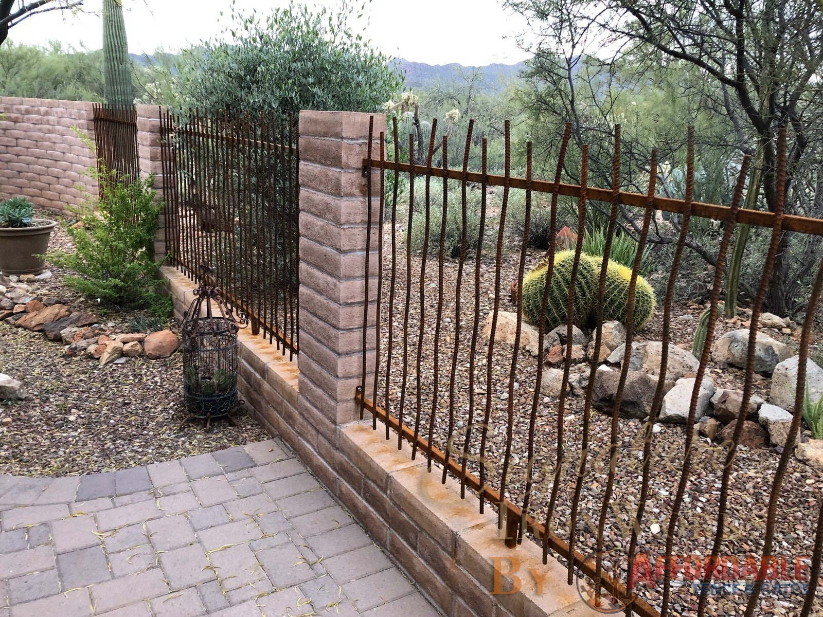Wall-mounted iron rebar fence 0489 - Wavy rebar installed in Tucson