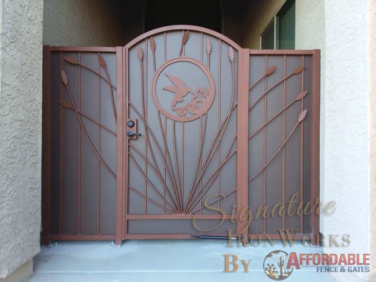 Security door with hummingbird and ocotillo motifs - 3 panels and arched door - Made in Tucson