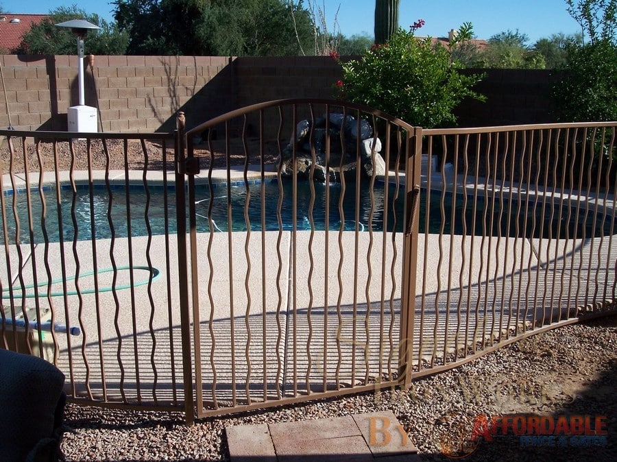 Wrought iron pool fence with alternate wavy pattern - installed in Tucson 00033